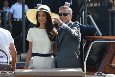 George Clooney. his wife Amal Clooney aboard a boat taxi after bezos, clooney, kardashian… these stars their civil marriage in Venice, September 27, 2014.