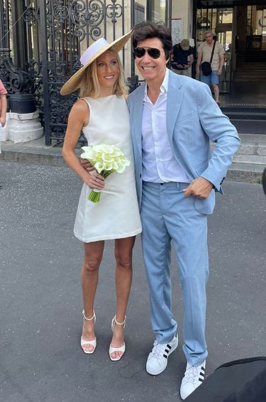 Jean-Luc Lahaye. Paola Aubin at the town hall of the 18th arrondissement for their marriage in Paris, July 2, 2025. jean-luc lahaye paola, kiss bride