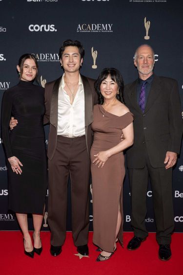 Hudson Williams surrounded by his parents and his partner Sunday May 31 at the Canadian Screen Awards.