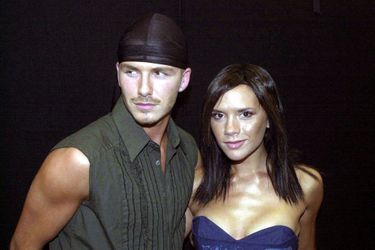 David Beckham et sa femme Victoria Beckham au Hyde Park à Londres en 2000.