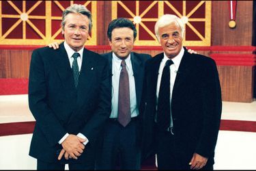 Alain Delon, Michel Drucker et Jean-Paul Belmondo en 1998.
