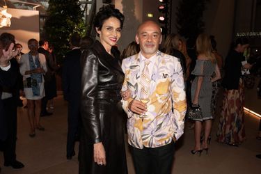 Farida Khelfa et Christian Louboutin au dîner de lancement des parfums Louis Vuitton «Les Extraits Collection» à la Fondation Louis Vuitton à Paris le 5 juillet 2021