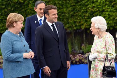 Emmanuel Macron avec Angela Merkel et la reine Elizabeth II, vendredi à l&#039;Eden Project. 