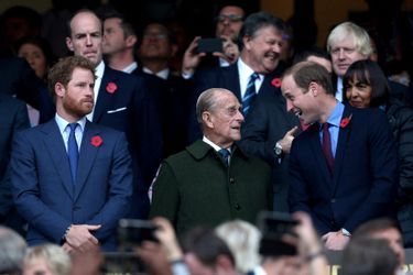 Le prince Philip avec ses petits-fils les princes Harry et William, le 31 octobre 2015