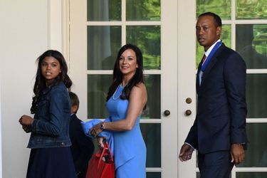 Tiger Woods avec sa compagne Eric Herman et ses enfants Sam et Charlie après avoir reçu la médaille présidentielle de la Liberté à la Maison Blanche à Washington en mai 2019 