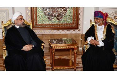 Le sultan Qaboos d&#039;Oman avec le président iranien Hassan Rohani à Mascate, le 12 mars 2014