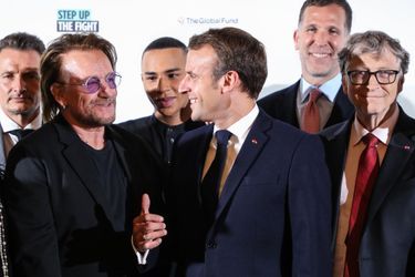Emmanuel Macron mercredi à Lyon aux côtés de Bono, d&#039;Olivier Rousteing et de Bill Gates. 