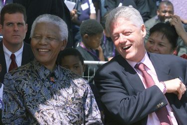 Avec Bill Clinton, en septembre 2002 