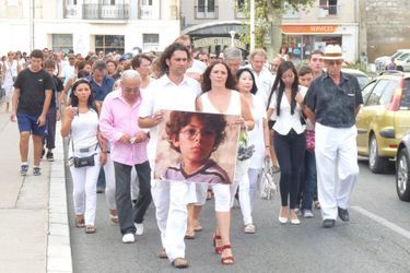 Les parents du petit Khoren lors d'une marche blanche en 2011.