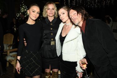 Lily-Rose Depp, Diane Kruger et son compagnon Norman Reedus lors de la soirée organisée par Chanel à New York le 10 décembre 2019. 