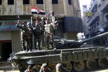 Pendant les combats, des drapeaux à l&#039;effigie d&#039;Assad
