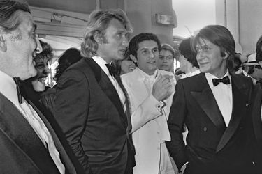 Johnny Hallyday et Jacques Dutronc (avec Claude Lelouch et Lino Ventura) à Cannes en 1979.
