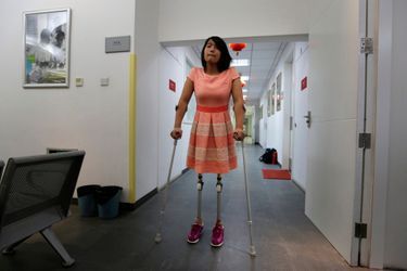 Qian Hongyan vient chercher ses jambes d'adulte, en septembre 2013