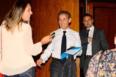 Nicolas Sarkozy arrive au concert de son épouse, Carla Bruni, à Sao Paulo, le 26 août 2015. 