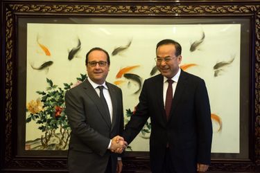 Le Président français avec le secrétaire du parti de Chongqing, Sun Zhengcai