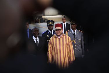 Le roi Mohammed VI du Maroc arrivant à Abidjan, en Côte d’Ivoire le 23 février 2014. 