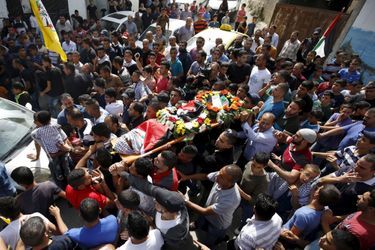 Palestiniens et Israéliens pleurent leurs morts