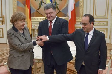 Petro Porochenko, François Hollande et Angela Merkel à Kiev le 5 février. 