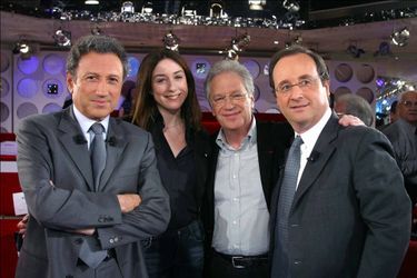 Michel Drucker (à gauche) et François Hollande (à droite) sont des amis de longue date. Photo d&#039;illustration prise en 2003.