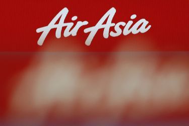 Une famille entière a raté le vol Air Asia qui a disparu des écrans dimanche matin. 