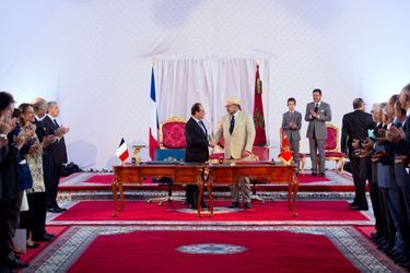 Le prince Moulay El Hassan avec le roi Mohammed VI du Maroc et le président François Hollande à Tanger, le 20 septembre 2015