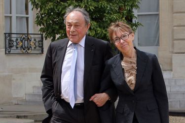 Michel et Sylvie Pélissier dans la cour de l'Elysée en mai 2012.