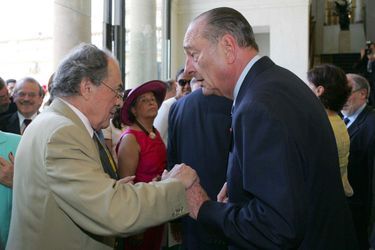Michel Rocard et Jacques Chirac lors de la garden-party à l'Elysée en 2005