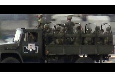 Camion de forces pro-Assad dans le centre de Damas
