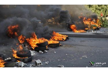 Pneus en feu à Jubar, banlieue de Damas
