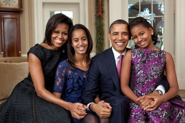 Barack et Michelle Obama avec leurs filles Malia et Sasha à Washington, le 11 décembre 2011