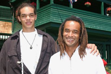 Yannick Noah et son fils Joakim à Rhode Island, le 9 juillet 2005