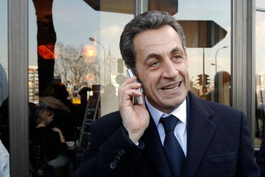 En février 2012, durant la campagne présidentielle, Nicolas Sarkozy près de son QG, à Paris.
