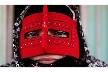 <br />
Femme Bandari qui porte la burqa en Iran
