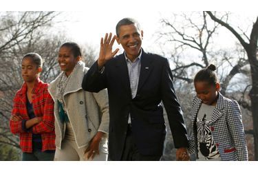 Barack Obama, accompagné de Michelle et de ses filles, est de retour à Washington après des vacances studieuses passées à Hawaï.