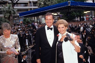 Roger Moore et son épouse Luisa Mattioli, au Festival de Cannes 1991. 