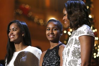 Michelle Obama avec ses filles Malia et Sasha, en décembre 2013.