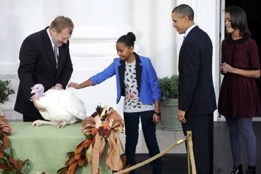 Barack Obama avec ses filles Malia et Sasha, en novembre 2011.