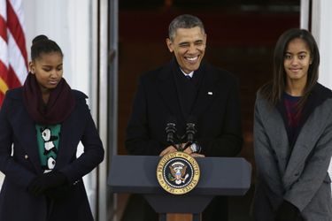 Barack Obama avec ses filles Malia et Sasha, en novembre 2013.