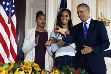 Barack Obama avec ses filles Malia et Sasha, en novembre 2014.