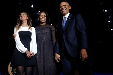 Michelle et Barack Obama avec leur fille Malia, en janvier 2017.