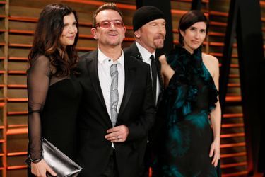 Bono et The Edge, et leurs femmes, à Hollywood le 3 mars 2014