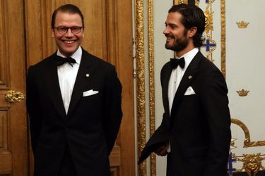 Daniel Westling et le prince Carl Philip de Suède pour le souper offert aux membres du Parlement à Stockholm, le 22 octobre 2014