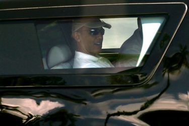 Barack Obama va s&#039;adonner à sa passion: le golf. Il s&#039;y rend en voiture blindée.