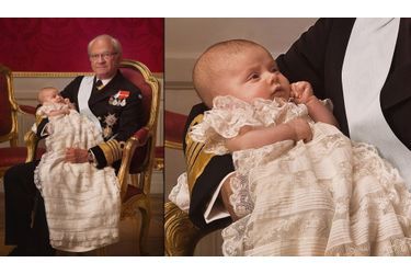 Estelle dans les bras de son grand-père, Carl XVI Gustaf