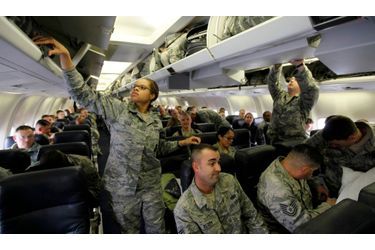A bord de l&#039;avion qui va leur faire quitter l&#039;Irak, ces soldats de l&#039;Air Force sont presque déjà chez eux.