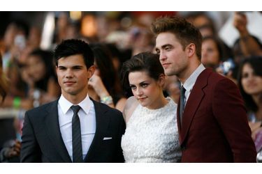 Taylor Lautner, Kristen Stewart et Robert Pattison se sont prêtés au jeu de la traditionnelle séance photo.