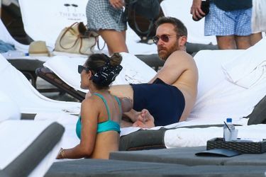 David Guetta et Jessica Ledon sur une plage de Miami, le 9 mars 2019