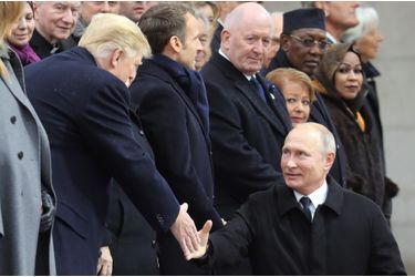11 novembre 2018. Vladimir Poutine arrive à l'Arc de Triomphe pour la cérémonie marquant le centenaire de l'armistice de 1918. 