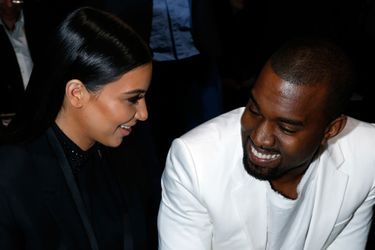 Kim Kardashian et Kanye West à Paris lors de la Fashion Week en mars 2013
