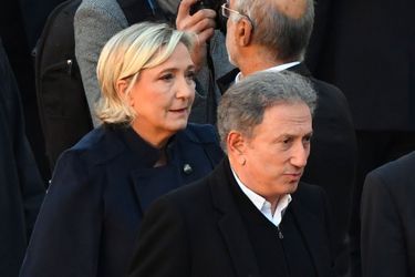 Marine Le Pen et Michel Drucker, vendredi aux Invalides.